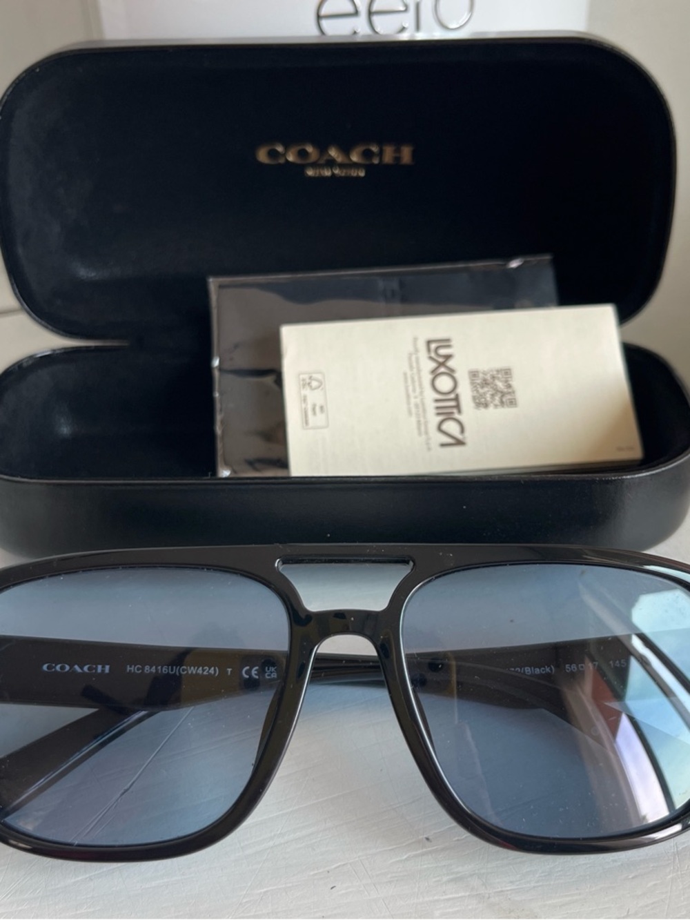 Coach Black Frame Sunglasses with Blue Gradient Lenses